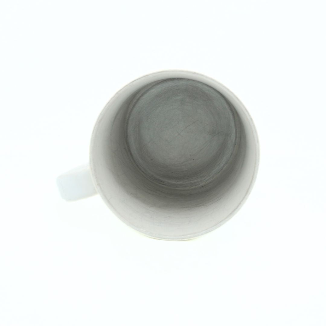 White mug with gray interior on a white background