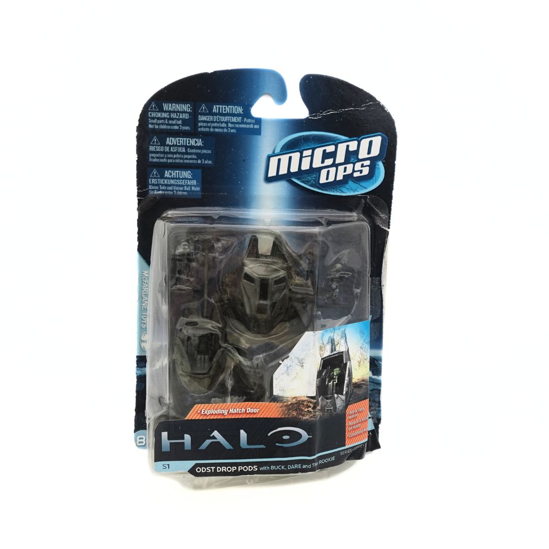 Front on photo of the Halo ODST Drop Pods showing the blue cardback with orange details, featuring Buck, Dare and The Rookie