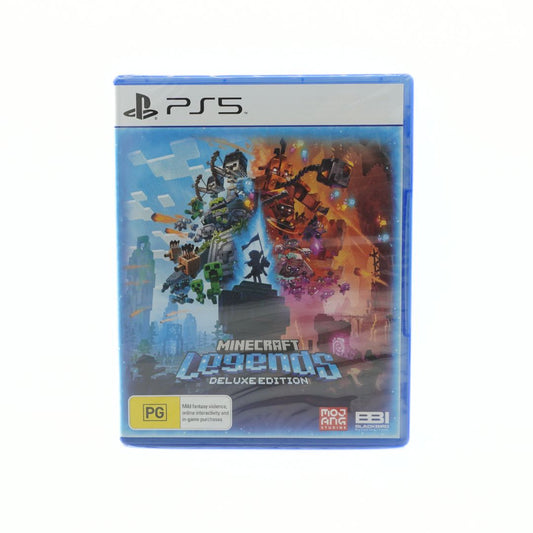Minecraft Legends Deluxe Edition for PlayStation 5, in its original blue plastic game case. The cover art features a split design with green and orange blocky characters, and logos for PS5, PlayStation, MEGA, and EGI are visible on the front.