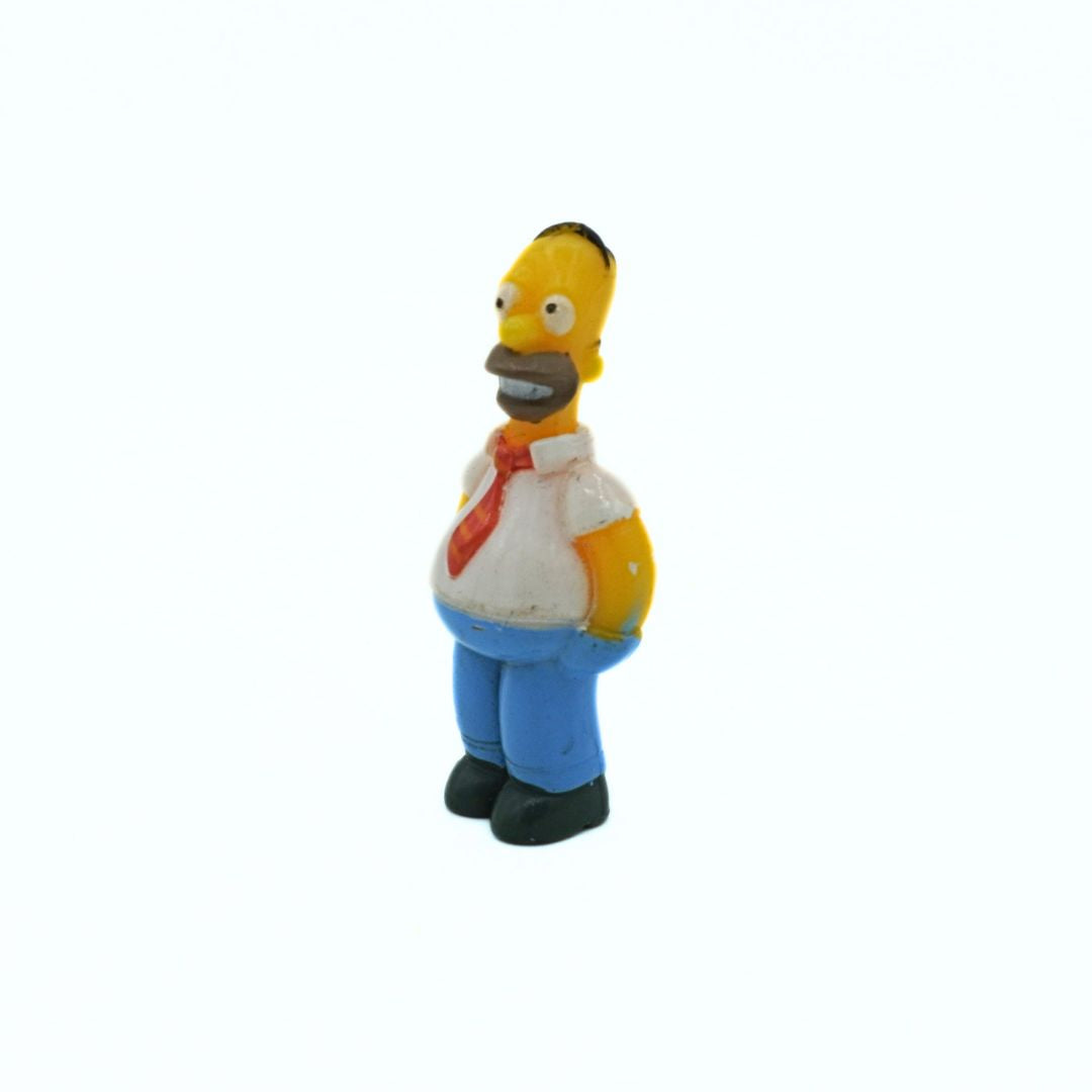 Figurine of a character from 'The Simpsons' on a white background