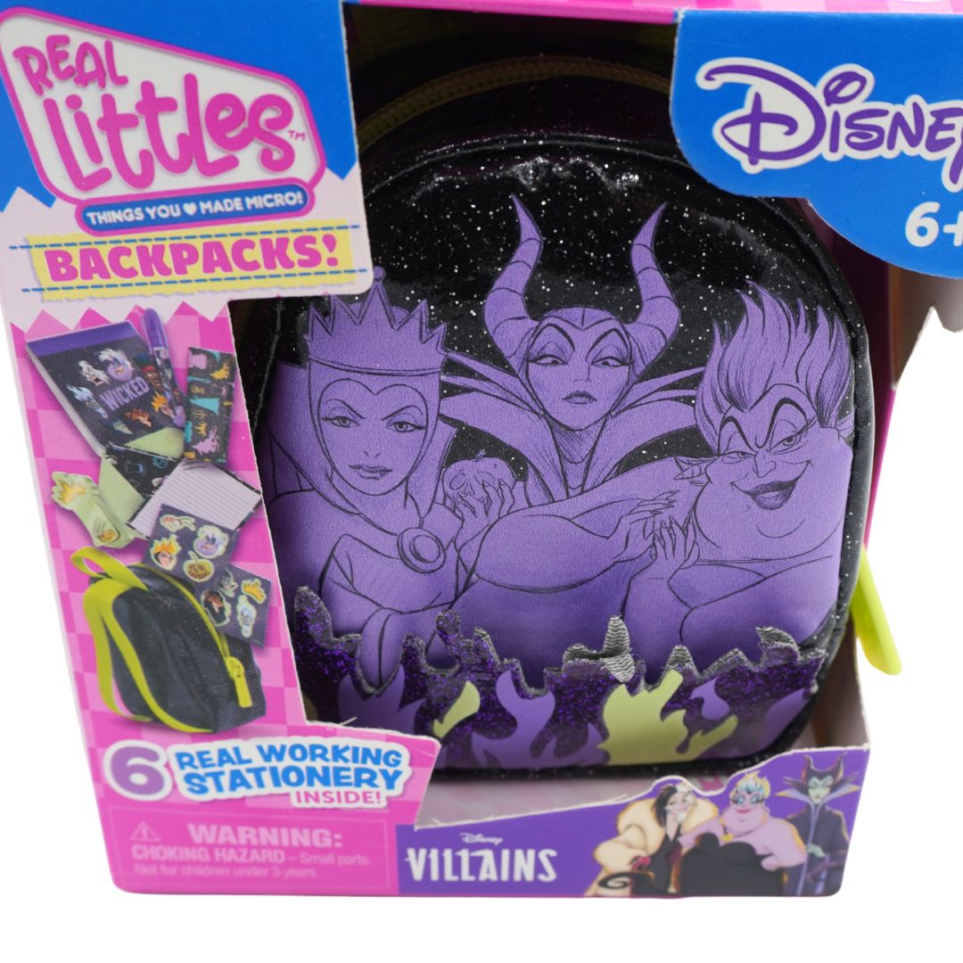 Disney Villains Real Littles backpack in its original retail packaging, featuring a purple glittery background with black line art of Maleficent, the Evil Queen and Ursula.