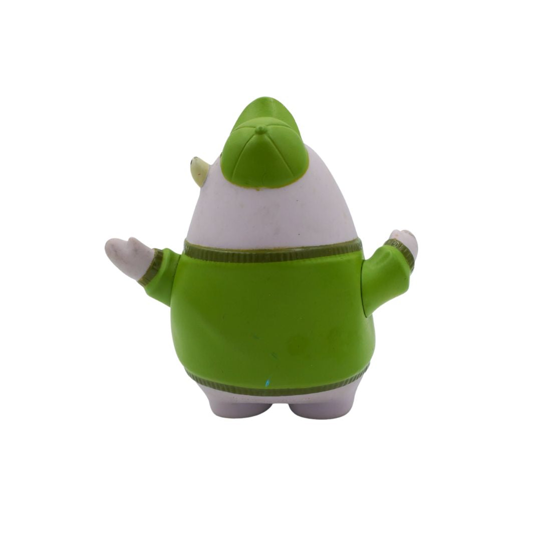 Green and white character toy on a white background