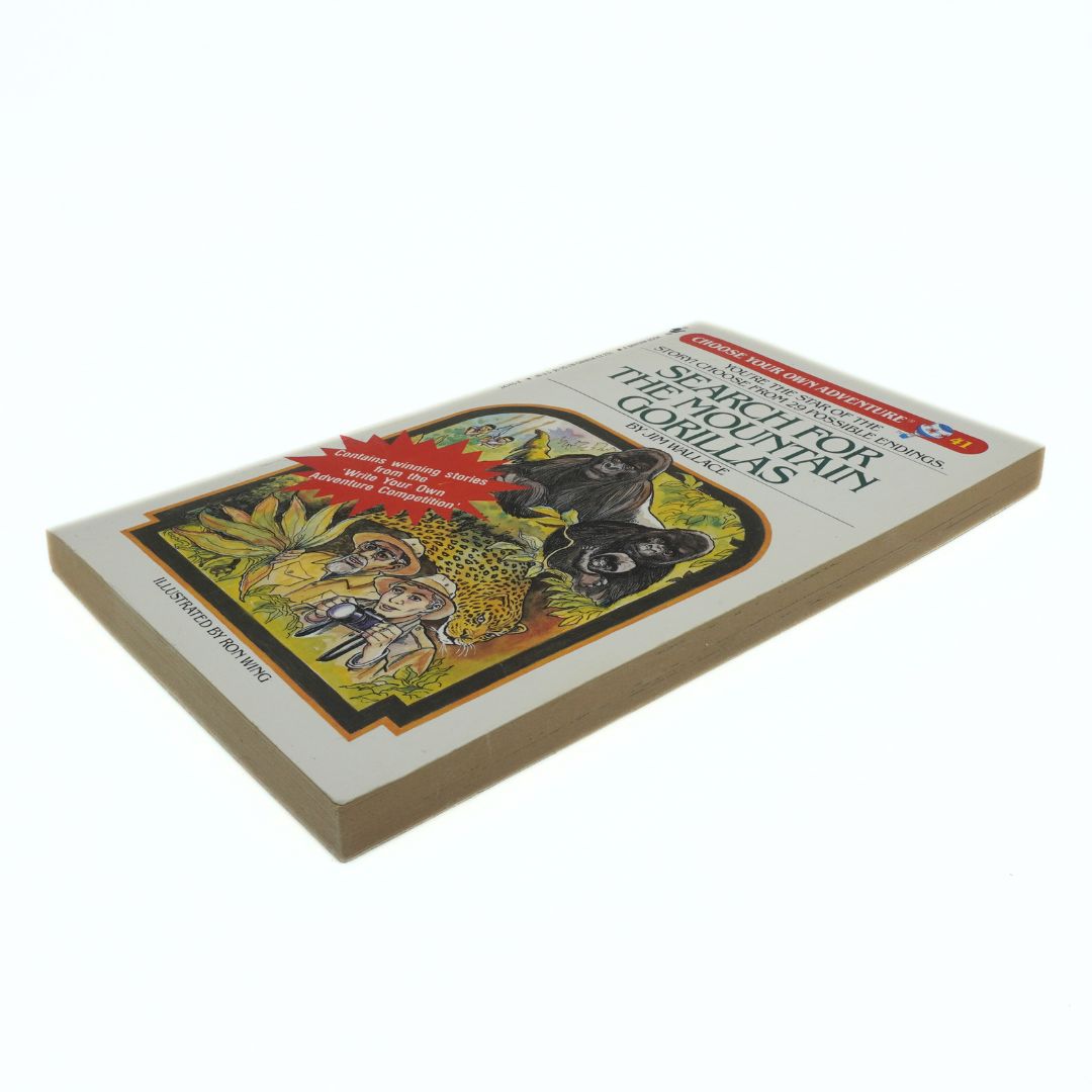 Book titled 'The Search for the Mountain Gorillas' with a colorful illustration on the cover.