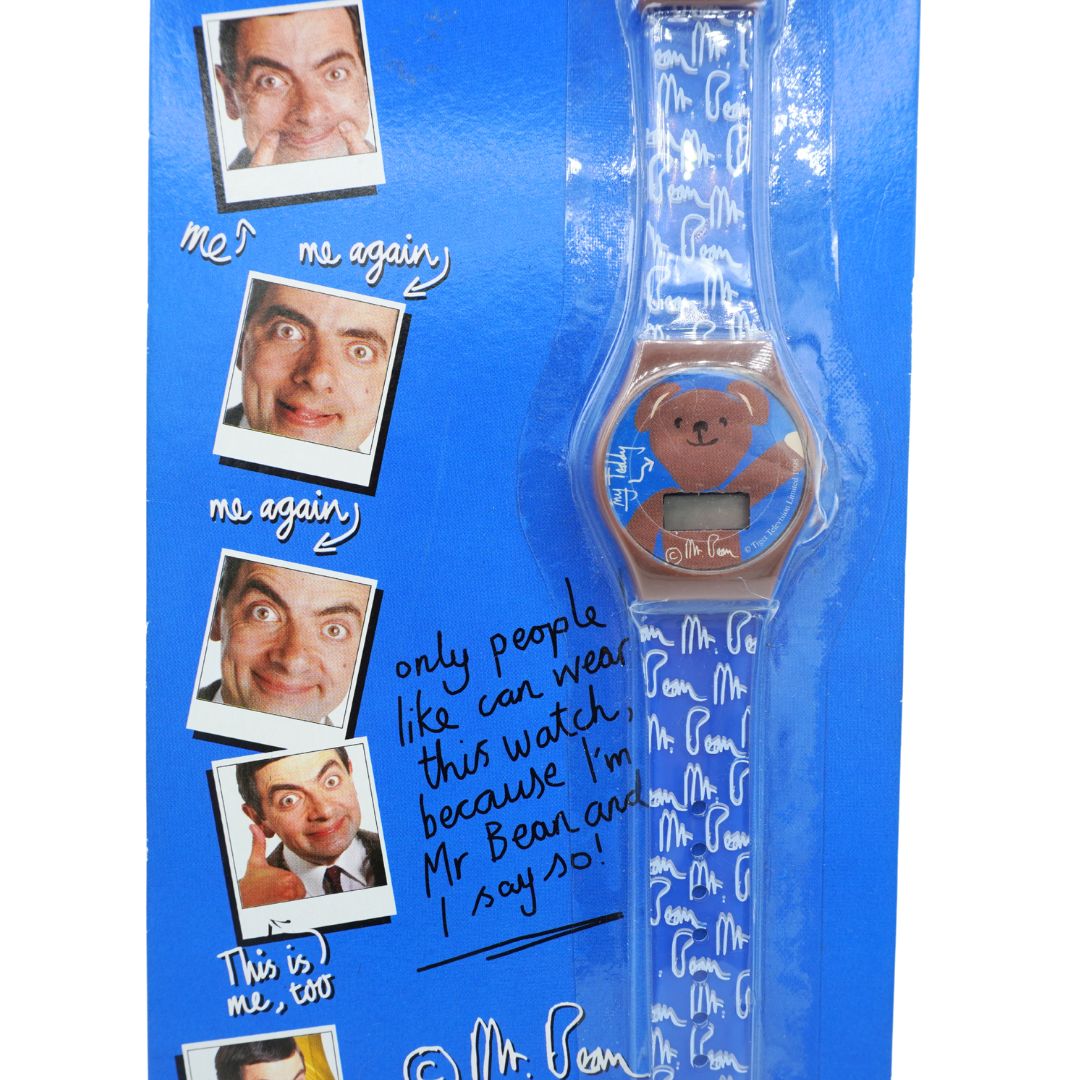 A Mr. Bean novelty watch on a blue printed backing card.