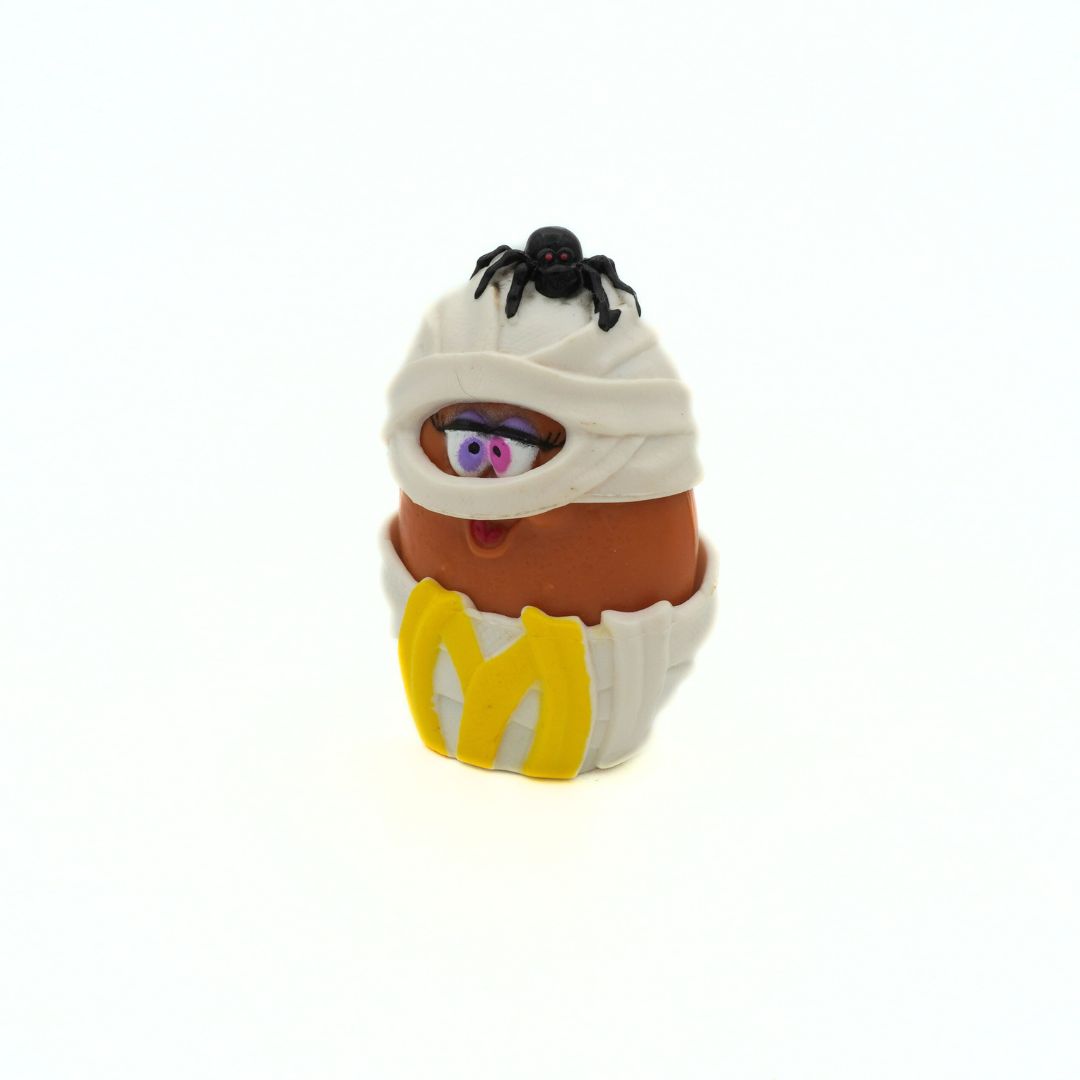 A vintage 1992 McDonalds Halloween McNugget Buddy, released as a Happy Meal toy, with a spider on its head