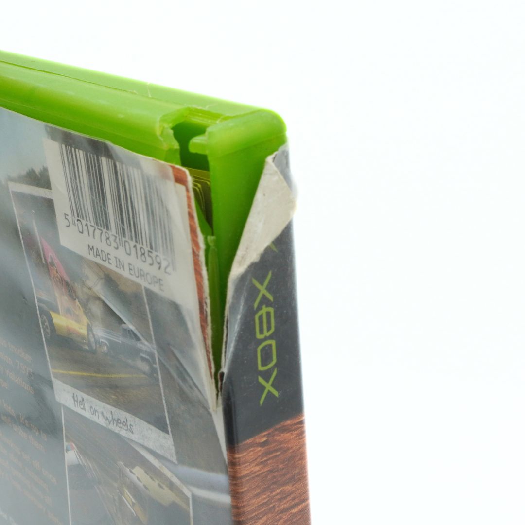 Close-up of a green Xbox product packaging with a clear window