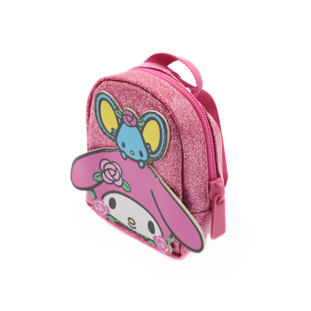 Small pink glittery backpack with a pink bunny and a blue mose