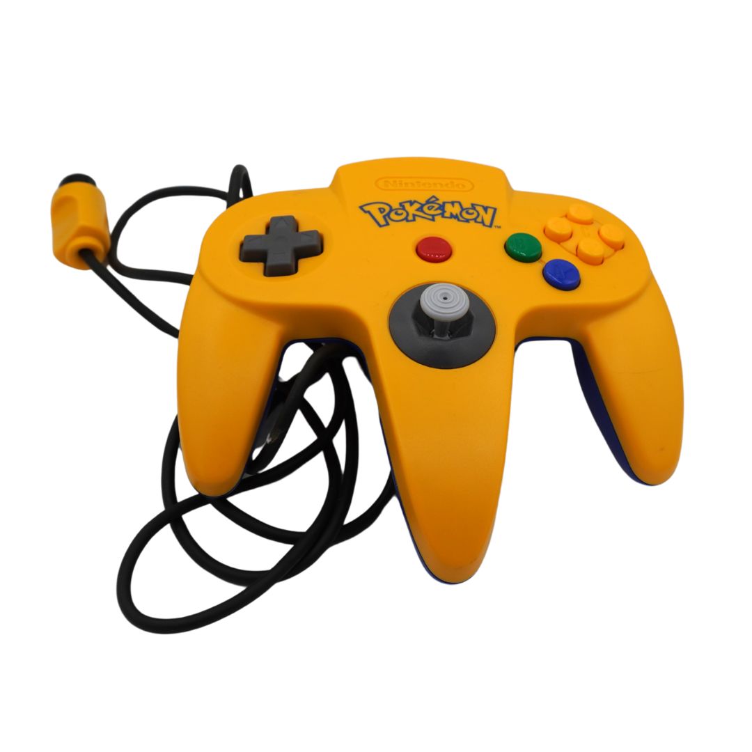 A yellow Nintendo 64 controller with the Pokemon logo on the top, featuring a black wired connection and a black cable coiled on a white background.