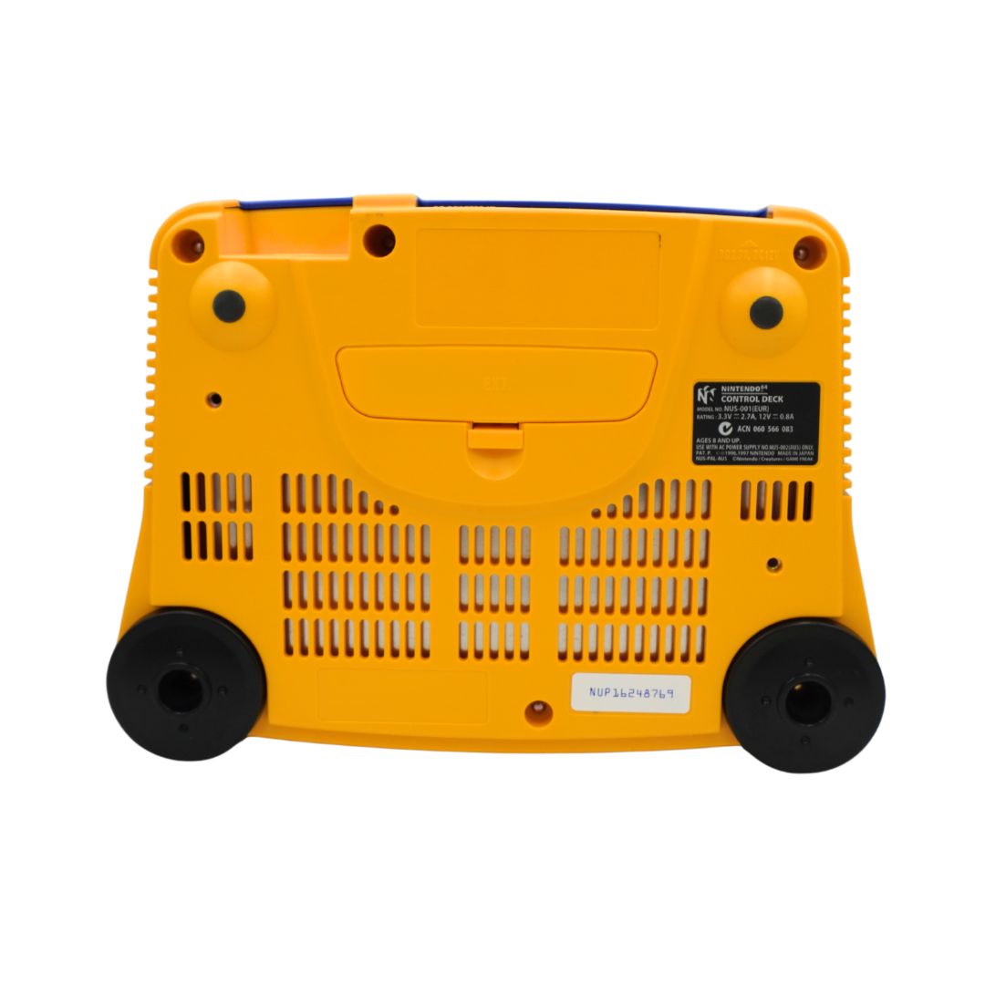 The underside of a yellow portable power bank or battery charger, showing ventilation grilles, black feet, and a black regulatory label on a white background.