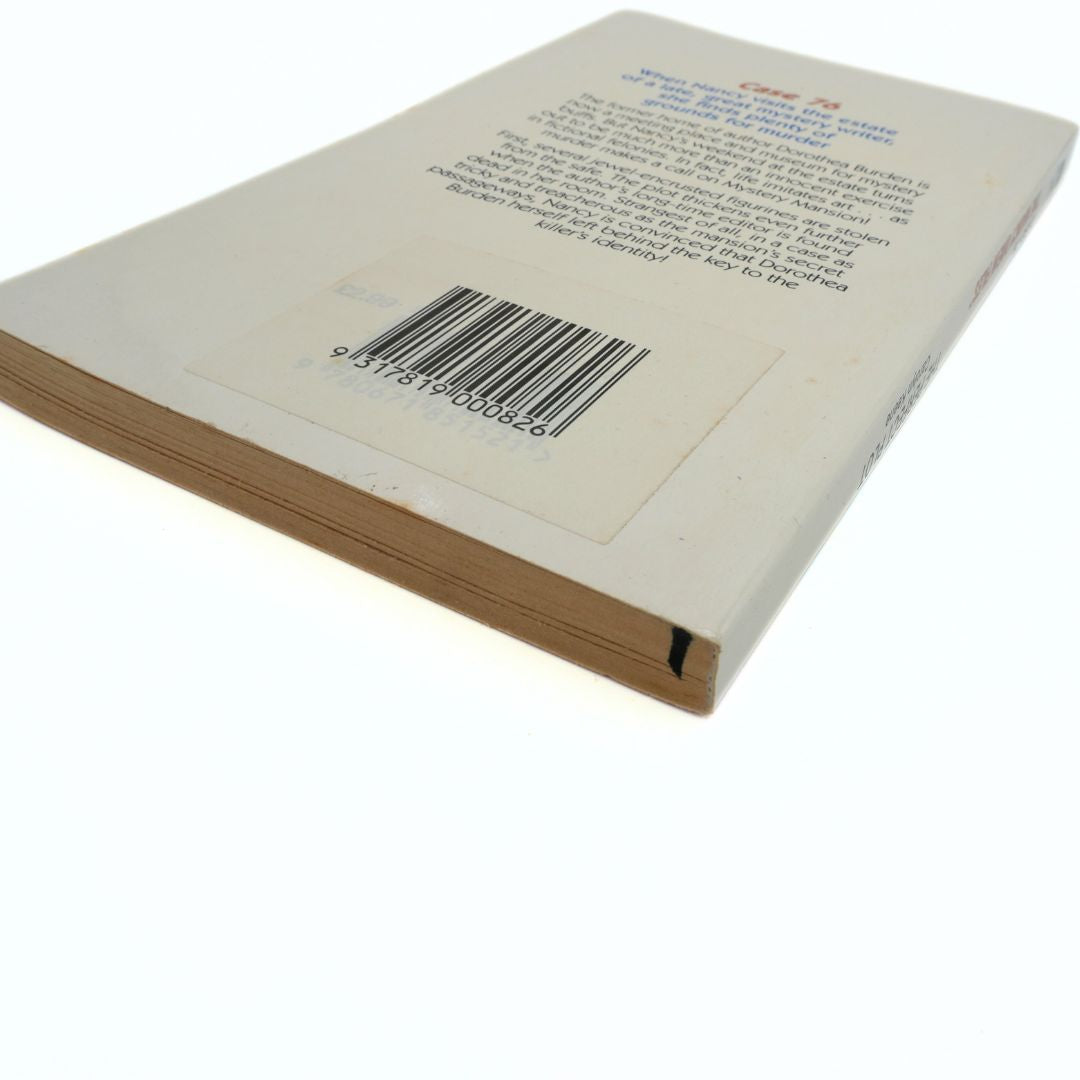 Back cover of a book with a barcode and text on a white background
