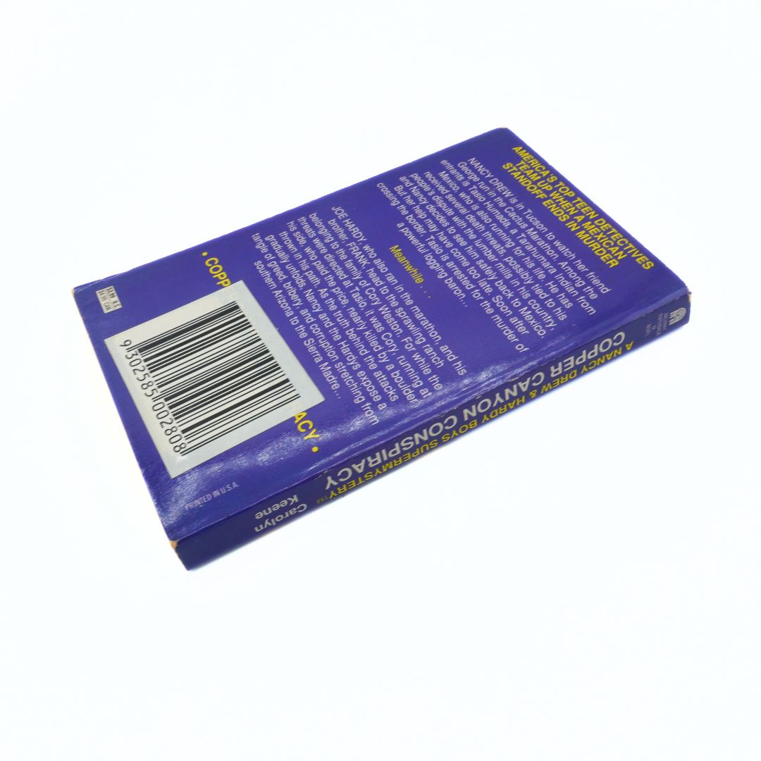 Blue product packaging with text and a barcode on a white background