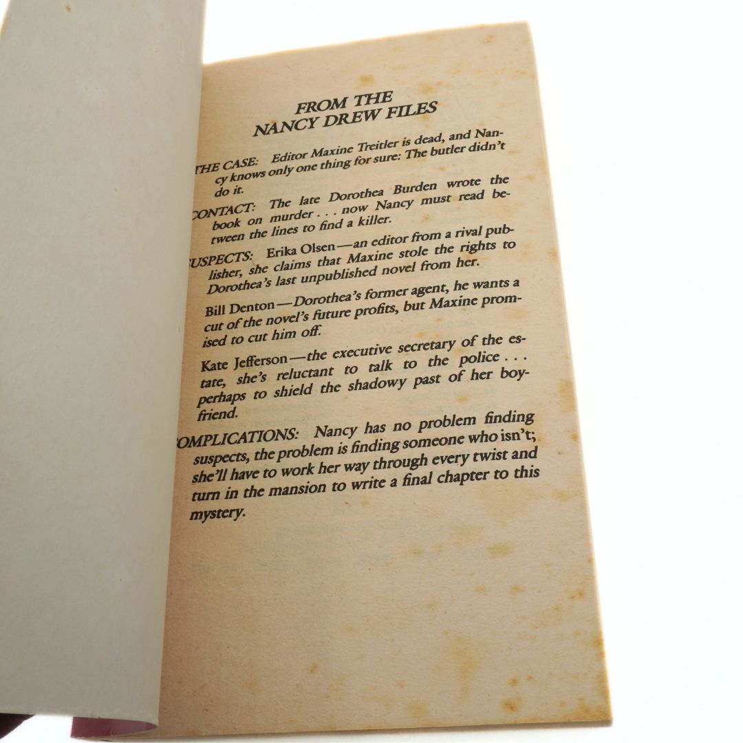 Book page from 'The Nancy Drew Files' with text on a white background