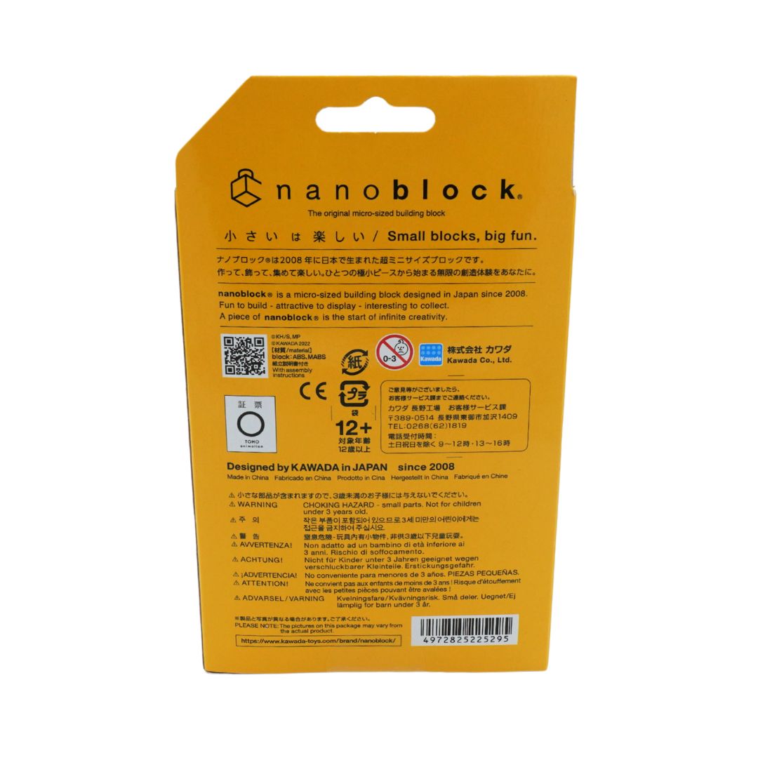The back of a yellow Nanoblock toy packaging box, featuring product information, safety certifications, and a barcode on a white background.