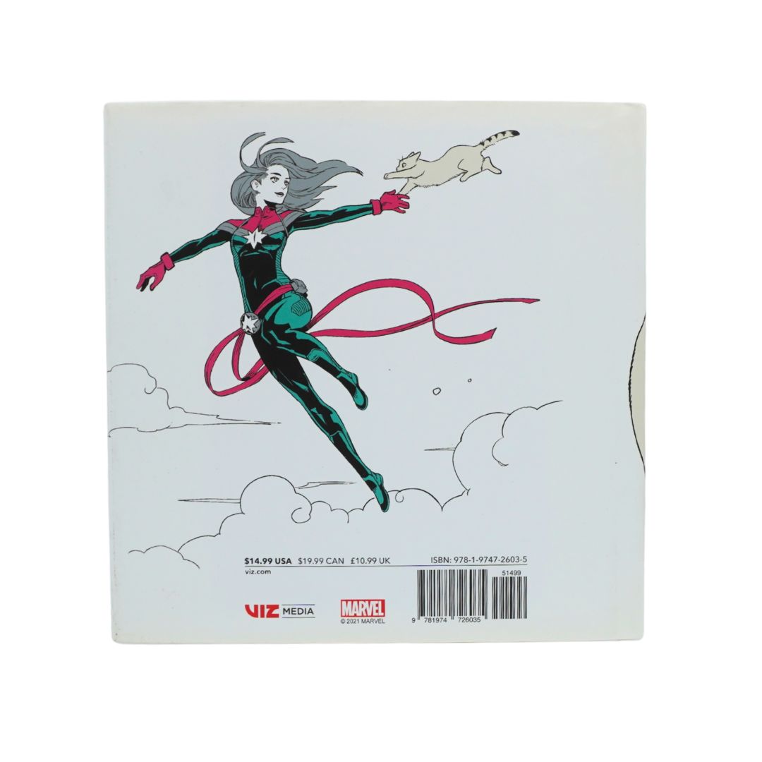 The back cover of a Marvel comic book, featuring an illustration of Captain Marvel flying with a small cat in the sky. The comic is published by Uliz Media and Marvel, with pricing and barcode details visible at the bottom.