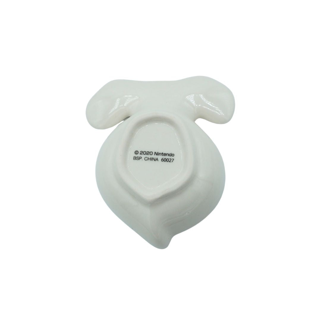White ceramic plate shown from the bottom, featuring a glossy finish and black printed copyright text for Nintendo.