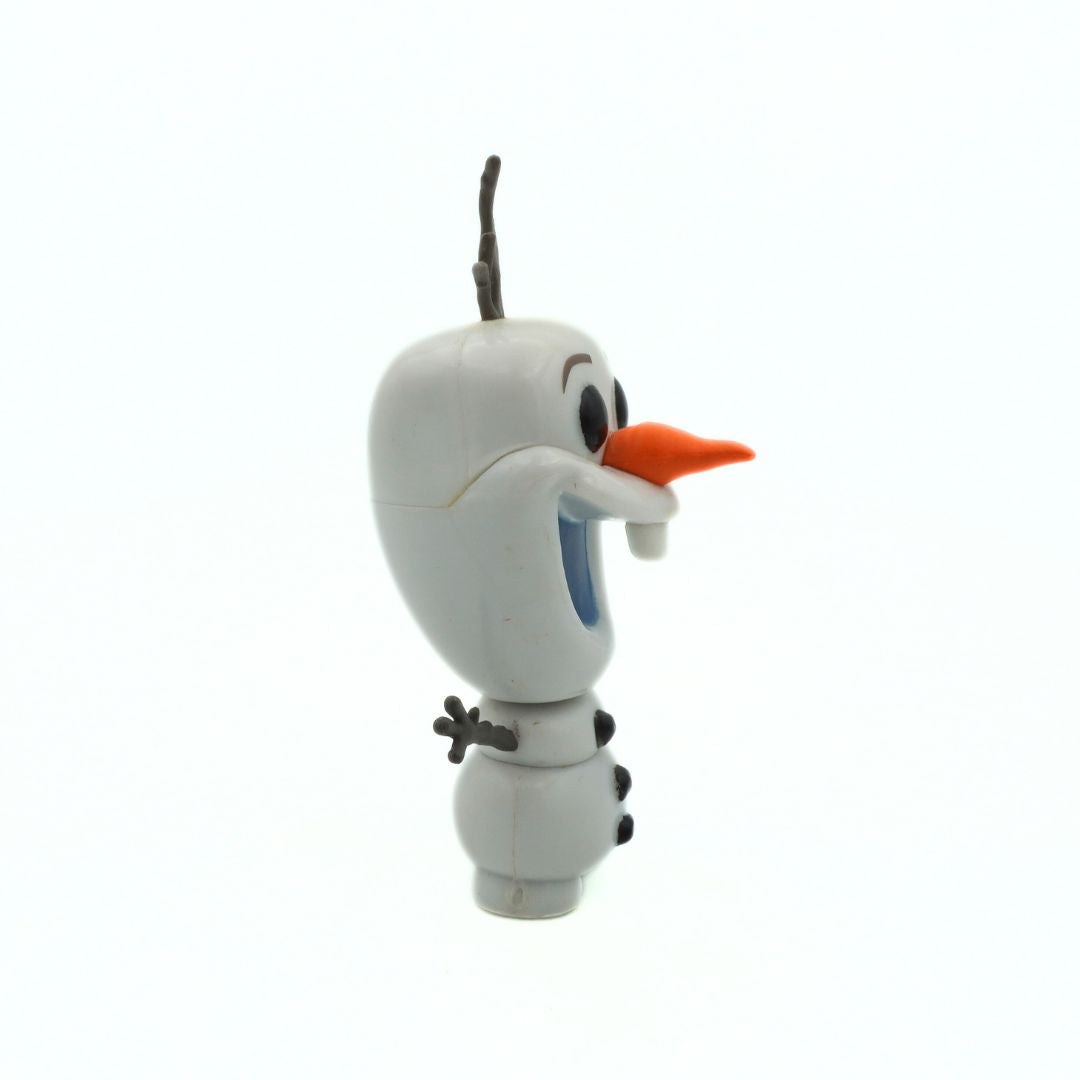 Toy figure of a snowman with an orange carrot nose on a white background
