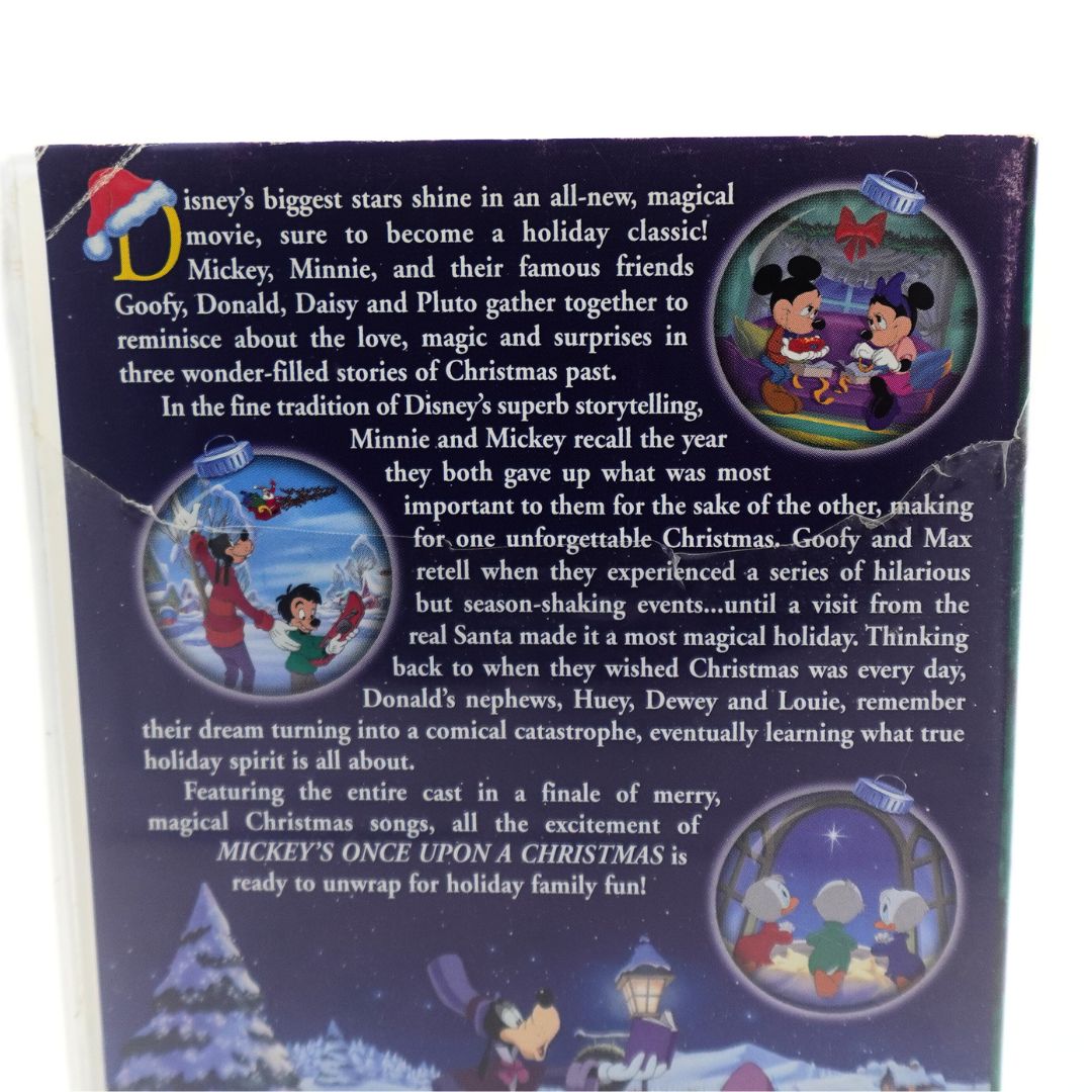 Damage to the back of the Disney Mickey's Once Upon a Christmas VHS