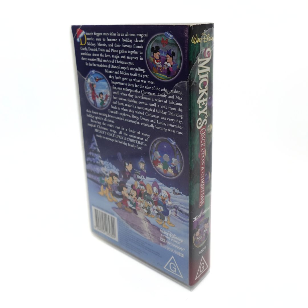 Photo of the back of the vintage Mickeys Once Upon a Christmas VHS tape