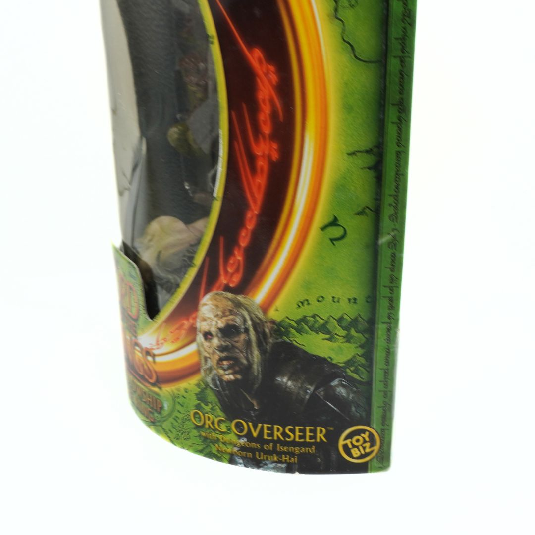 Toy figure packaging with a character and branding on a white background