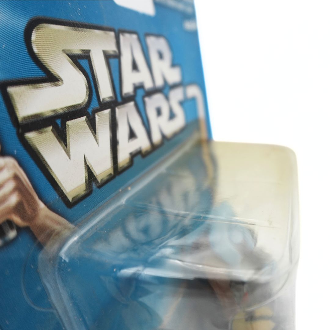 Close up of the bubble from the 2002 Hasbro Star Wars Orn Free Taa figurine packaging