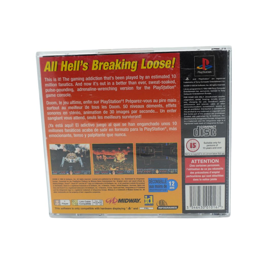 Back cover of a vintage Playstation game of Doom, photographed against a white background