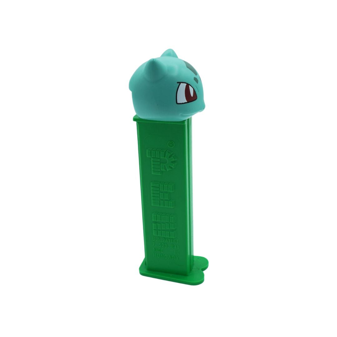 Green PEZ dispenser with a character on a white background