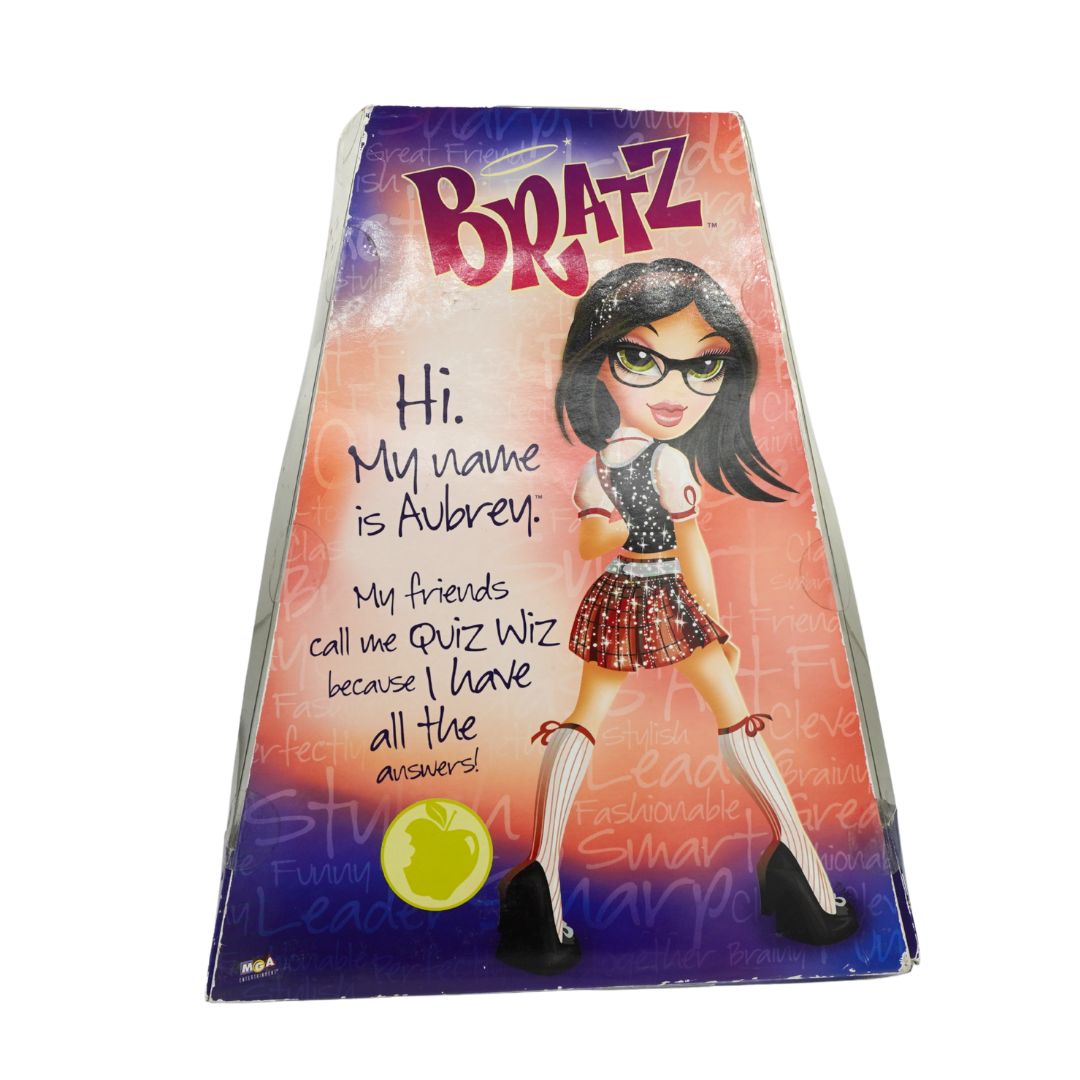 A Bratz box featuring an illustrated character named Aubrey with the text 'Hi. My name is Aubrey!' and a purple-to-pink gradient cover.