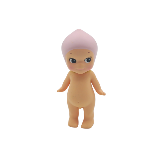 A peach themed Sonny Angel with a light pink peach hat, photographed on a white background.