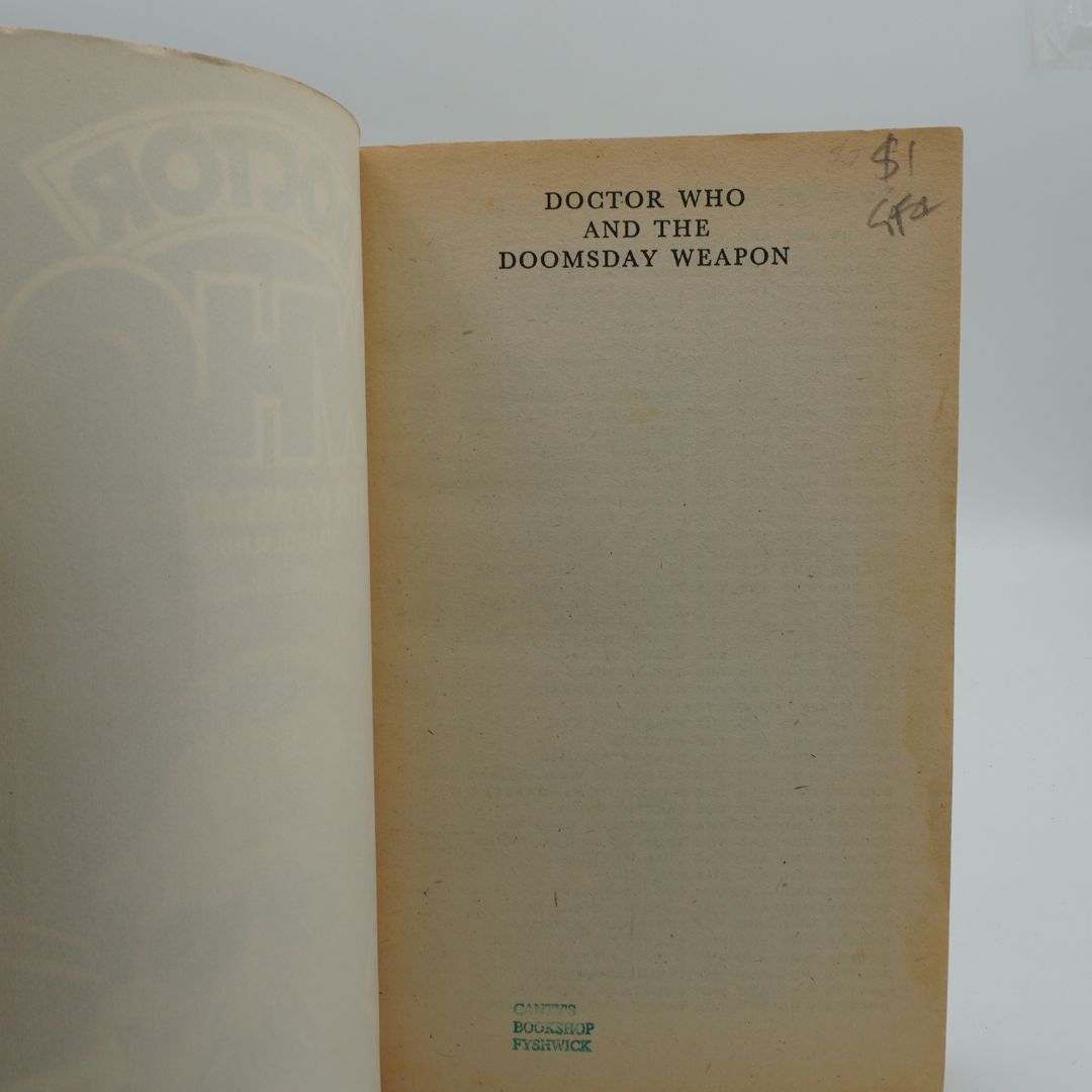 Book titled 'Doctor Who and the Doomsday Weapon' on a plain background