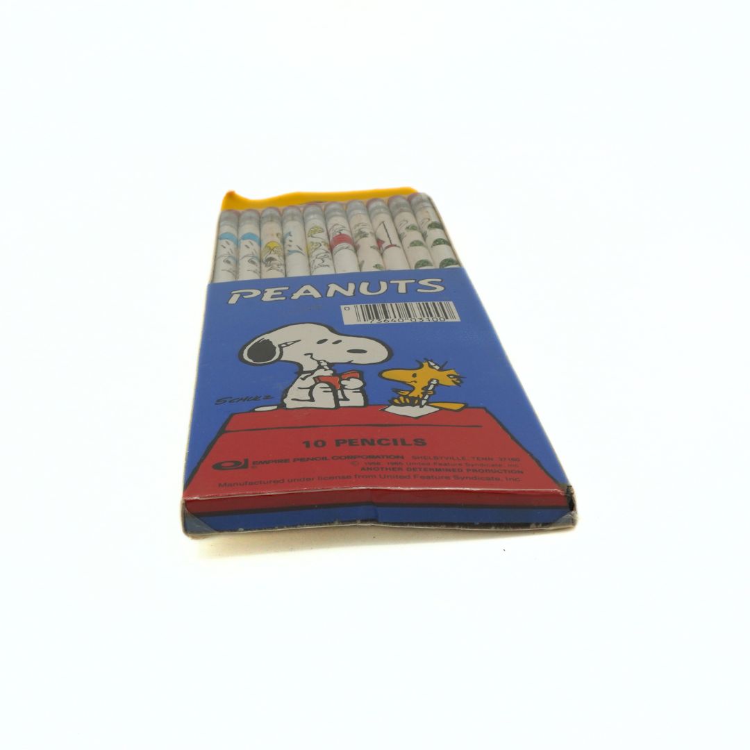 Pack of Peanuts-themed pencils with Snoopy and Woodstock on a blue background