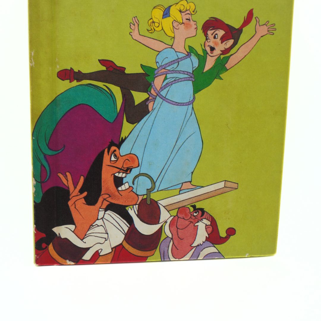 Vintage book cover with animated characters on a green background