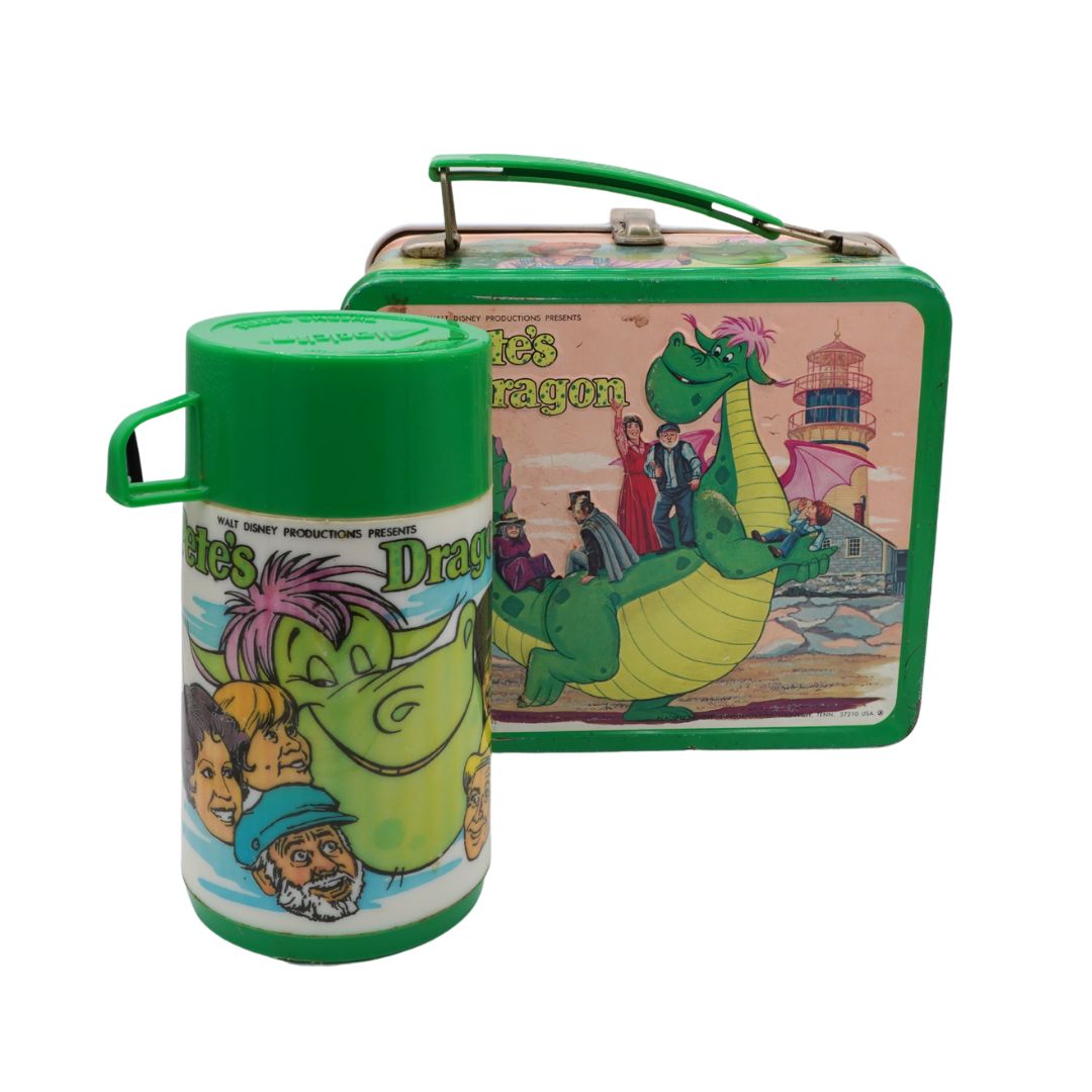 Tin lunch box and thermos with 'Pete's Dragon' design on a white background