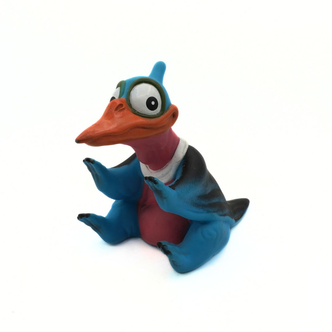 Colorful cartoon-like creature figurine on a white background