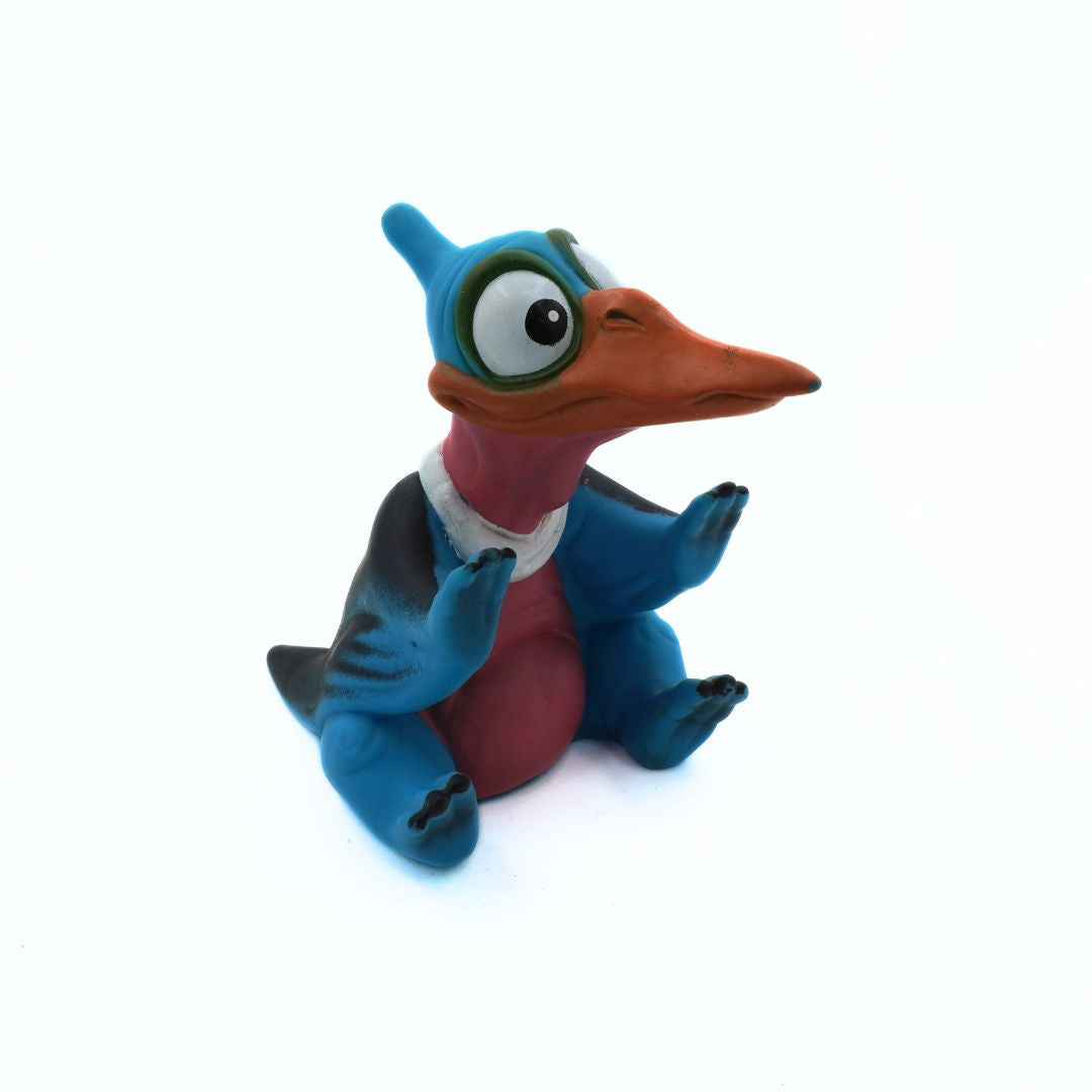 Colorful cartoon-like creature with a blue body and orange beak on a white background