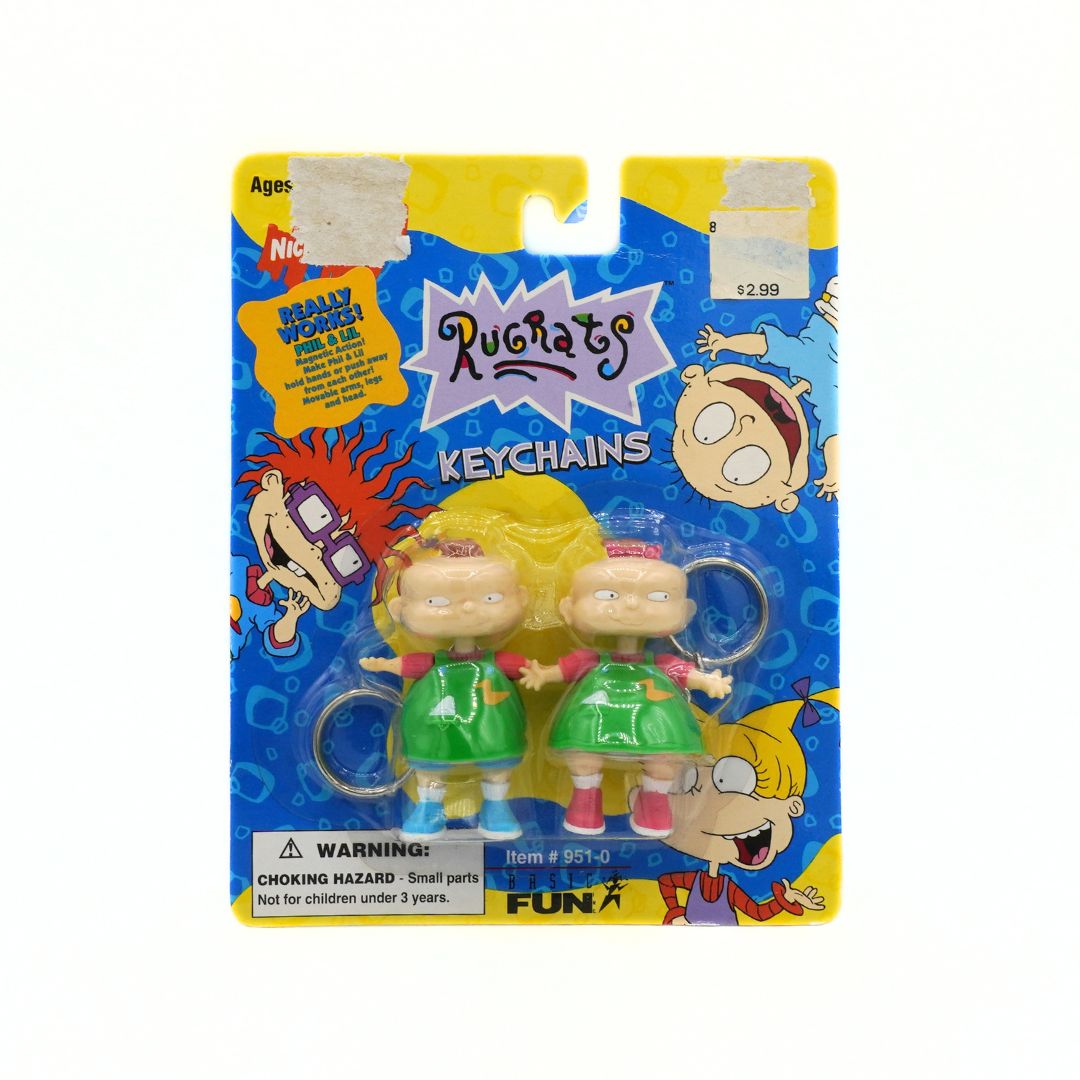 Packaged keychains featuring cartoon characters with colorful packaging.