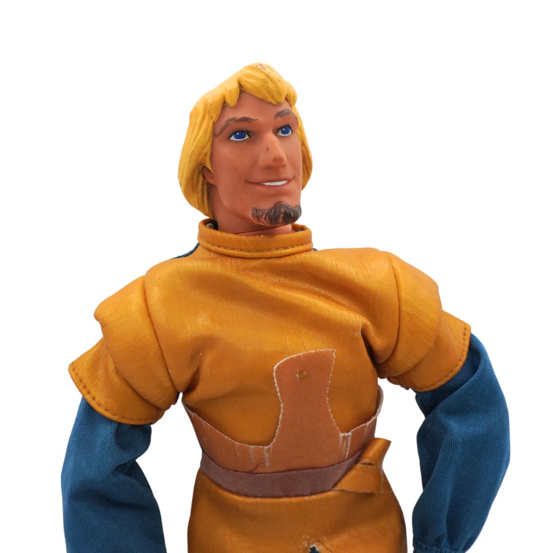 Toy figure in a yellow and blue outfit on a white background