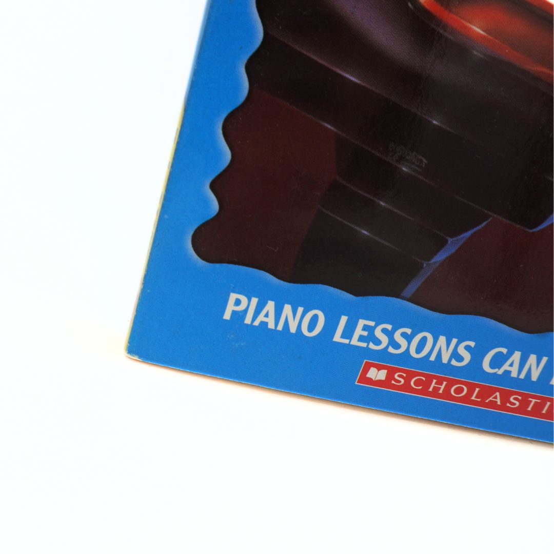 Corner of a Goosebumps book showing light damage