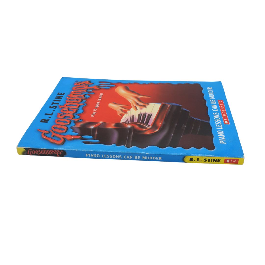 Piano Lessons Can Be Murder paperback with a blue and red cover
