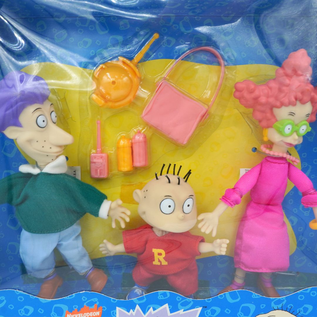 Toy figures in packaging with a blue border
