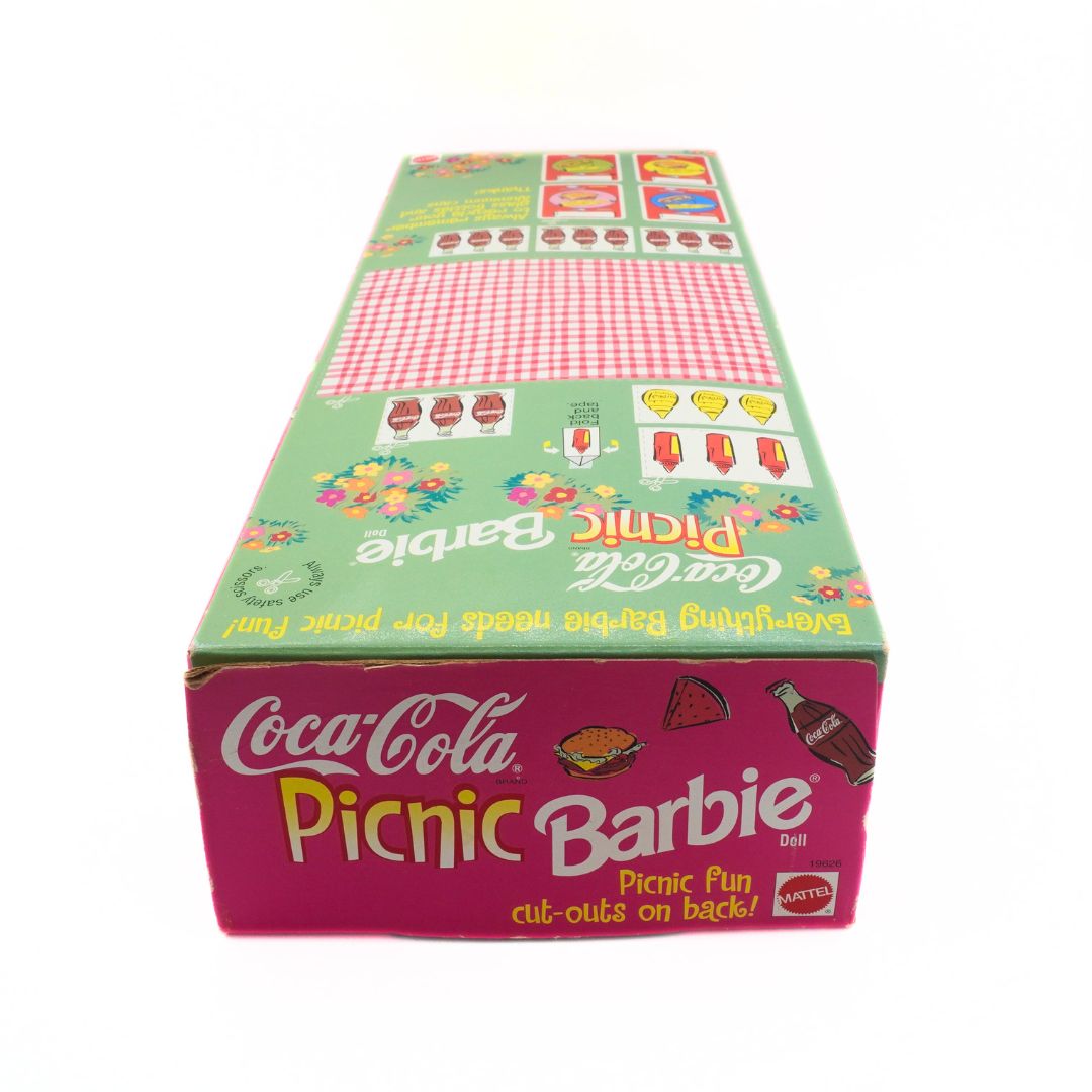 Box for Coca-Cola Picnic Barbie set with colorful design on a white background