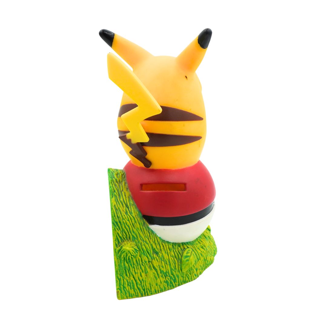 Pikachu figurine on a white background