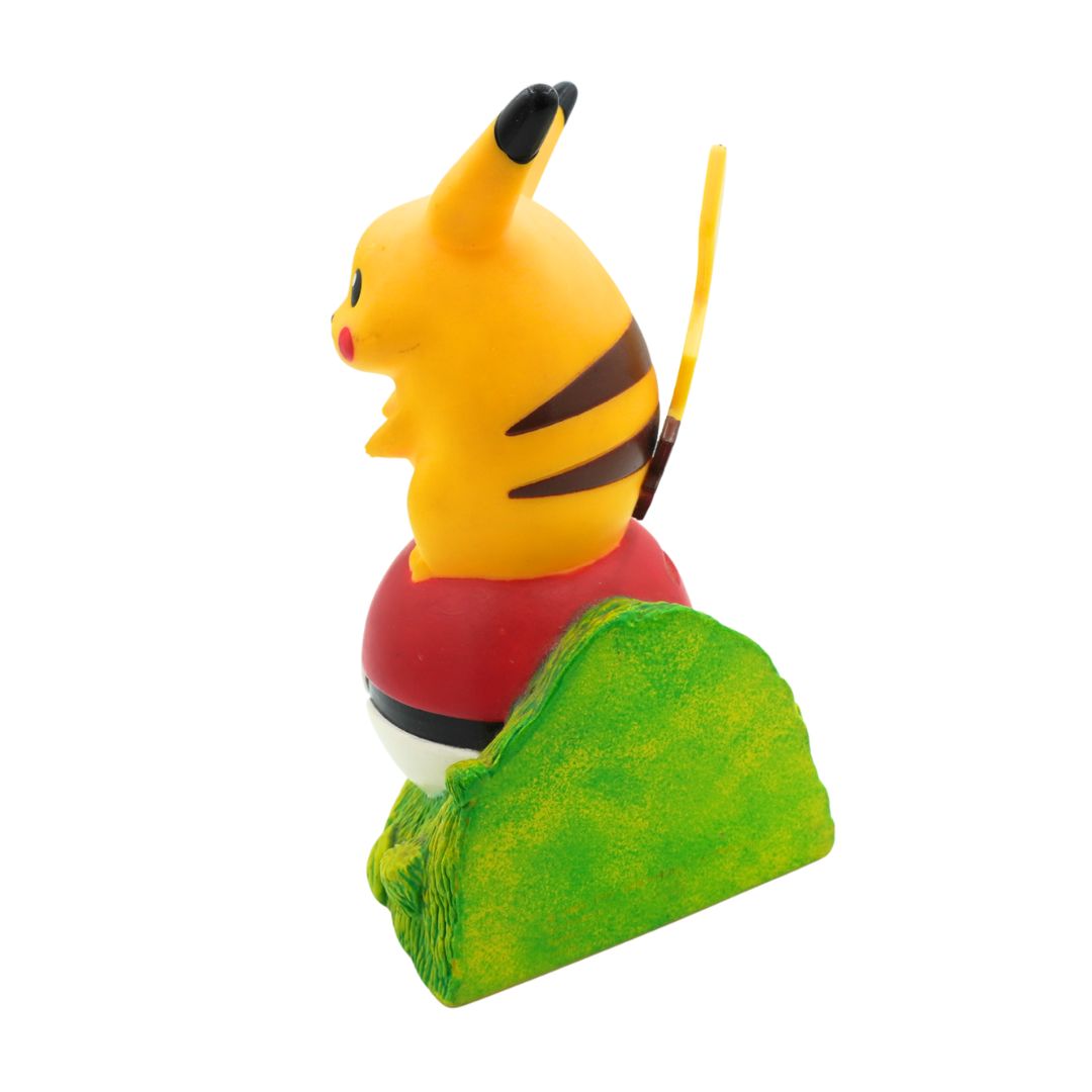 Toy figure of a bee-like character on a white background