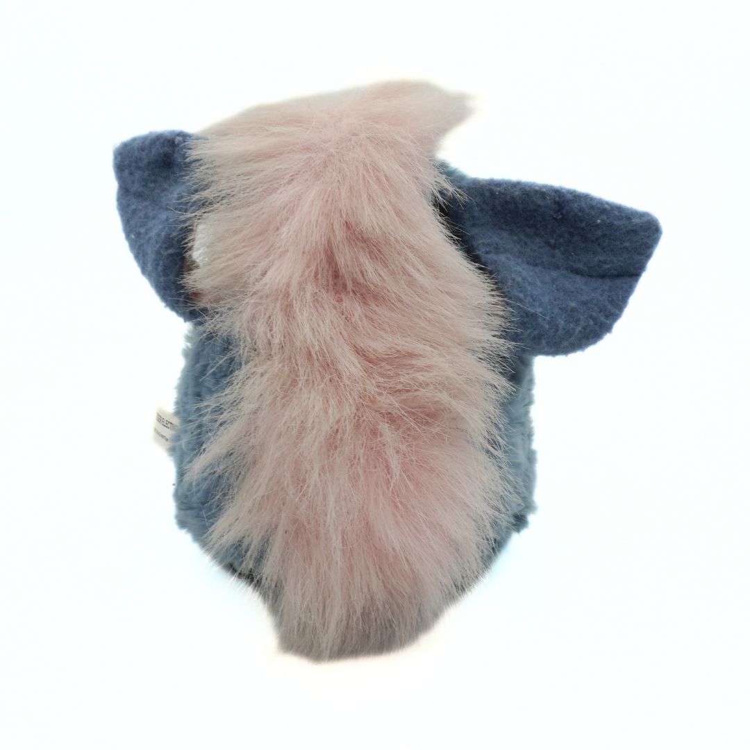Blue and pink fur product on a white background