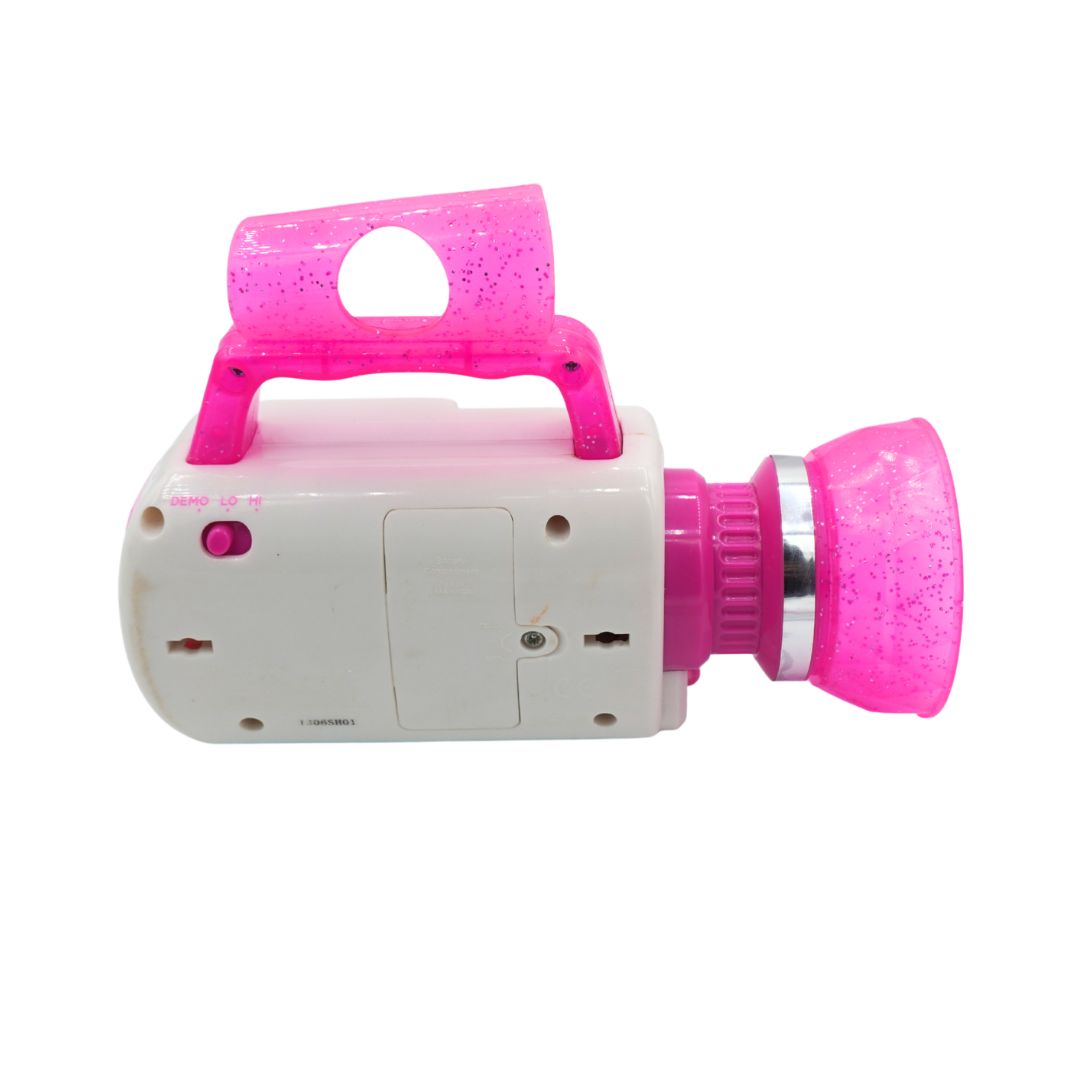 A pink and white toy camera with a translucent glittery pink handle and lens, shown against a plain white background.