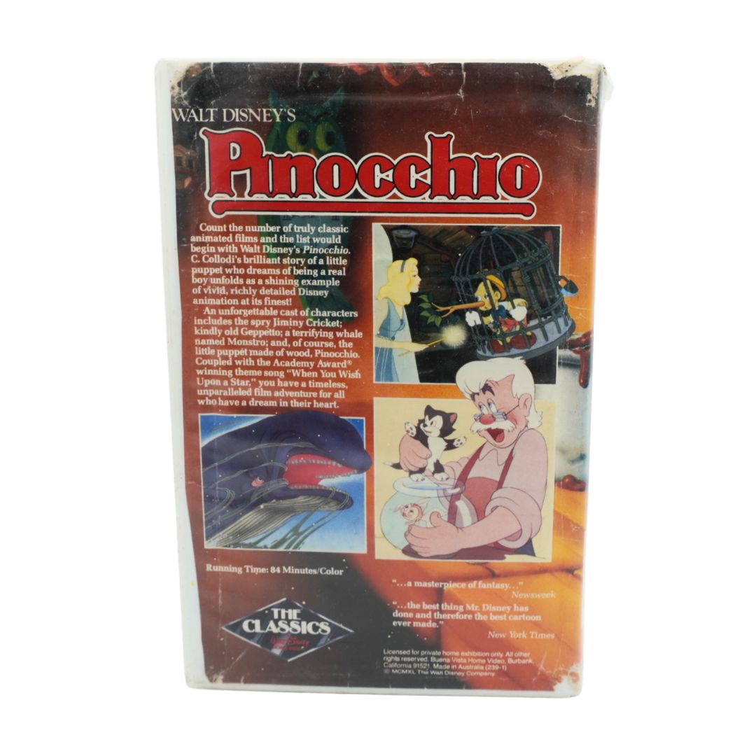 A vintage Walt Disney's Pinocchio VHS video case from The Classics series, showing the back cover with character illustrations and product text on a white background.