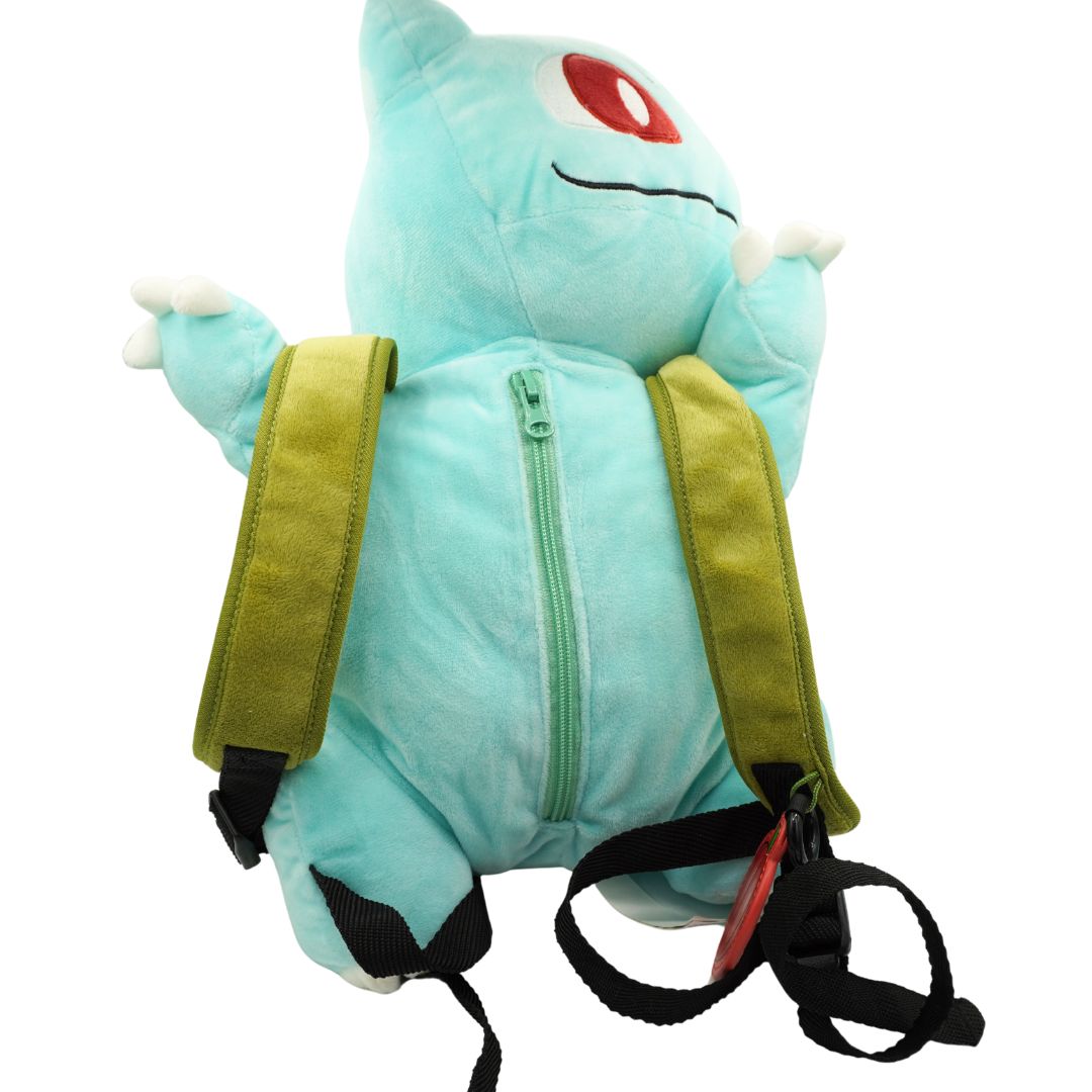 Plush backpack shaped like a blue creature with a red circle on a white background