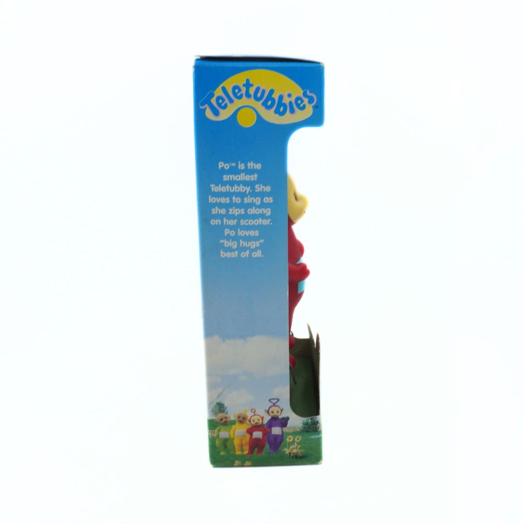 Teletubbies toy packaging with character illustration and text on a white background
