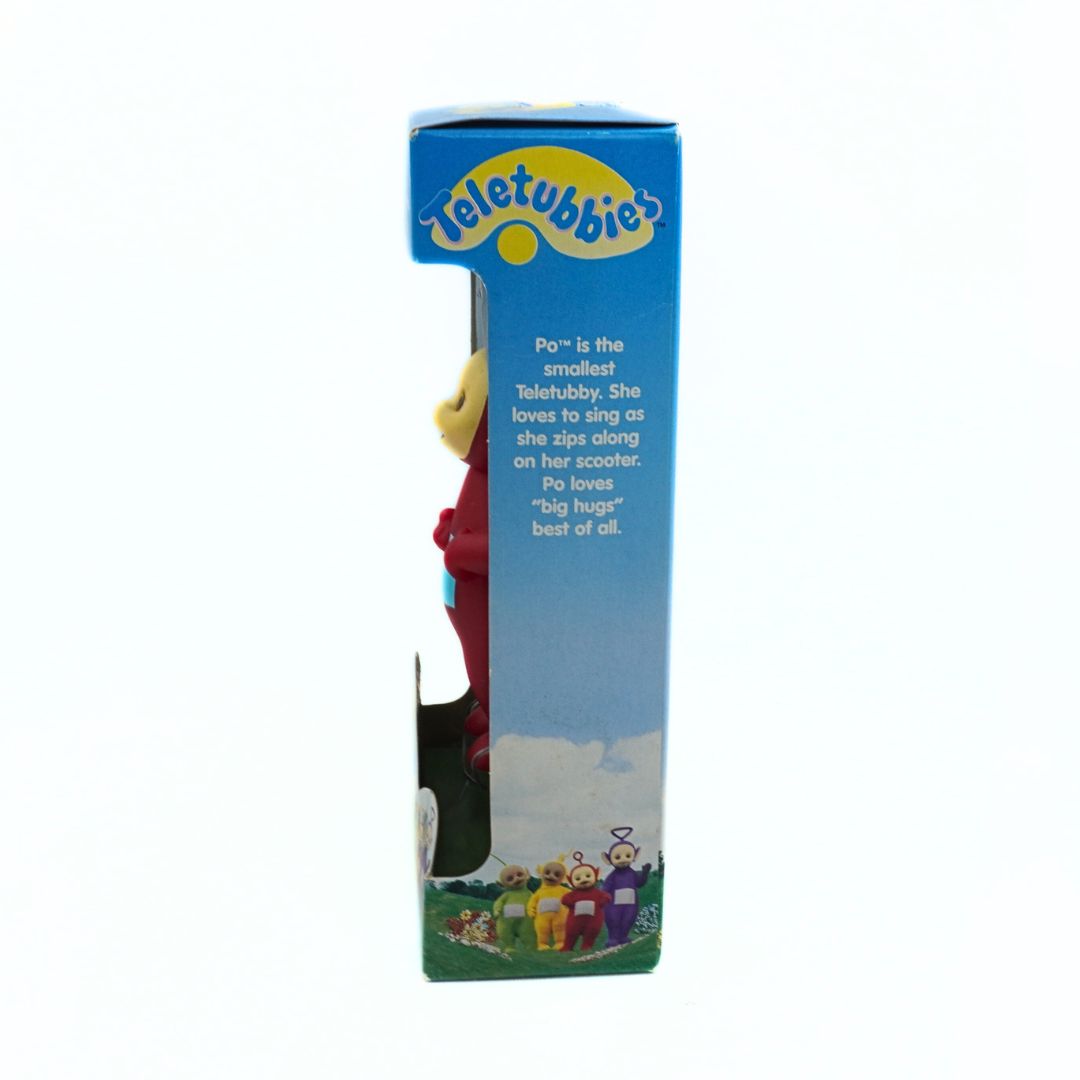 Teletubbies character figure in a blue box with character description