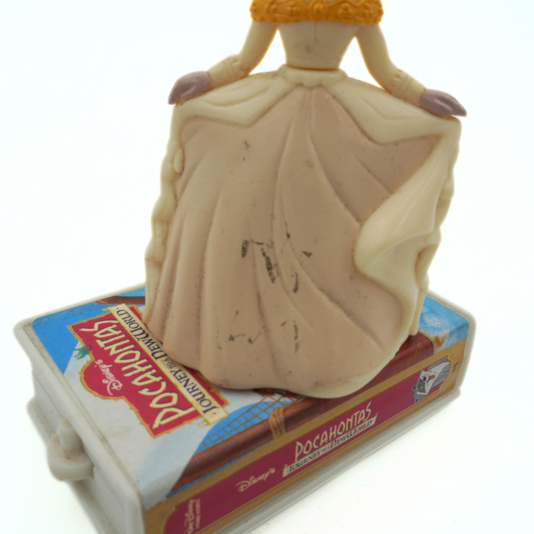 Marks to the golden gown on a 1998 McDonalds Pocahontas Toy