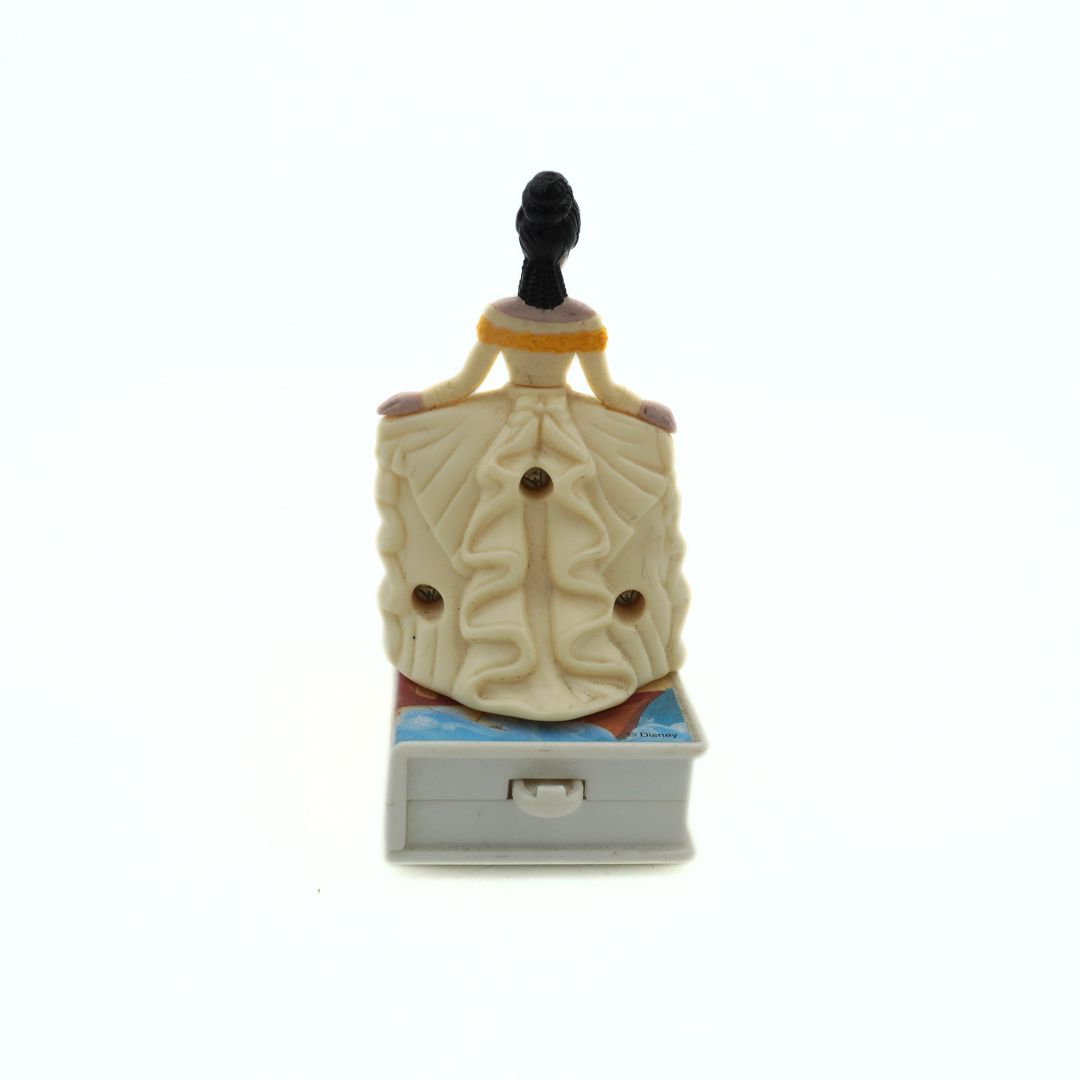 Back of a 1998 Pocahontas McDonalds toy released in line with Journey to a New World featuring her standing on a mini VHS tape